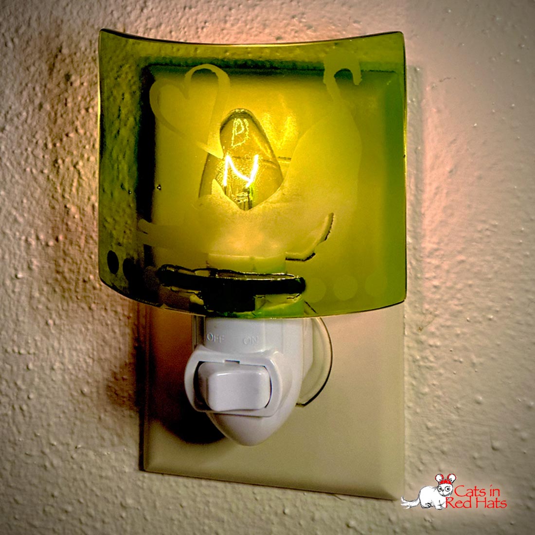 night light with etched stretching cats design