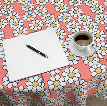 photo of table with daisey pattern table cloth